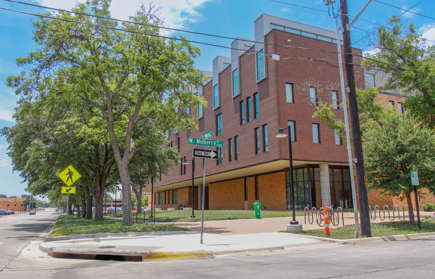 The UNT Art Building seen from the crossroads of Welch and Mulberry streets.